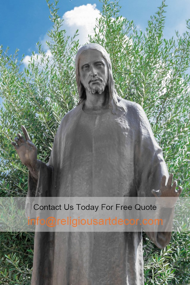 Jesus Christ statue with olive tree