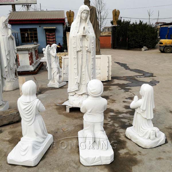 fatima statue with three shepherd child