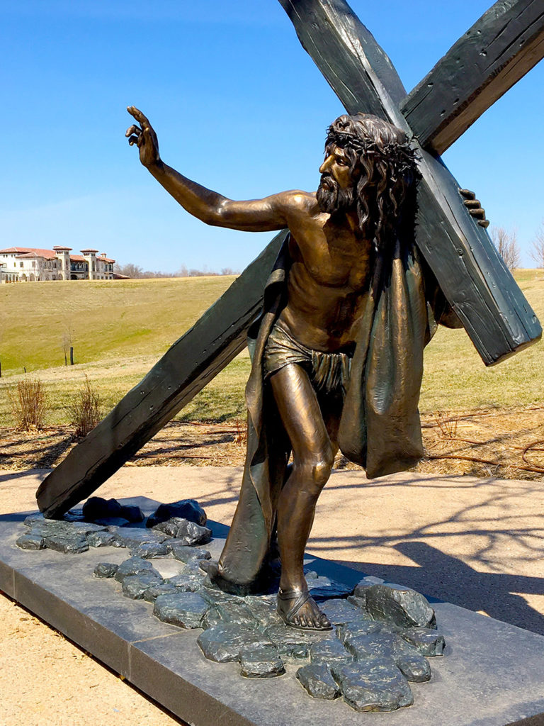 Jesus crucifixion and the cross sculpture