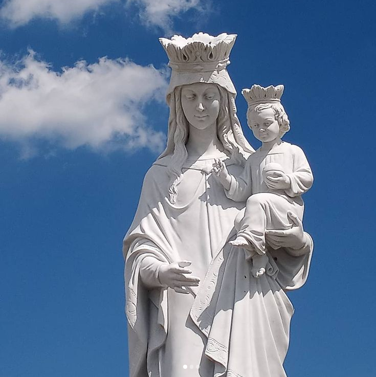 Beautiful mother mary holding jesus marble statue